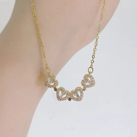 COLLAR AMOR ETERNO TRÉBOL Y CORAZONES